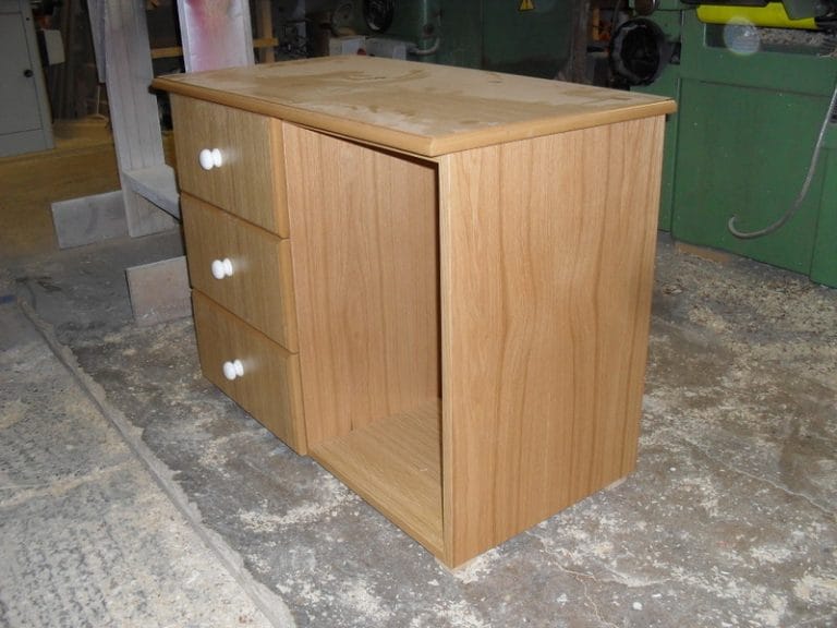 Timber chest of drawers unit for a dressing room before fitting