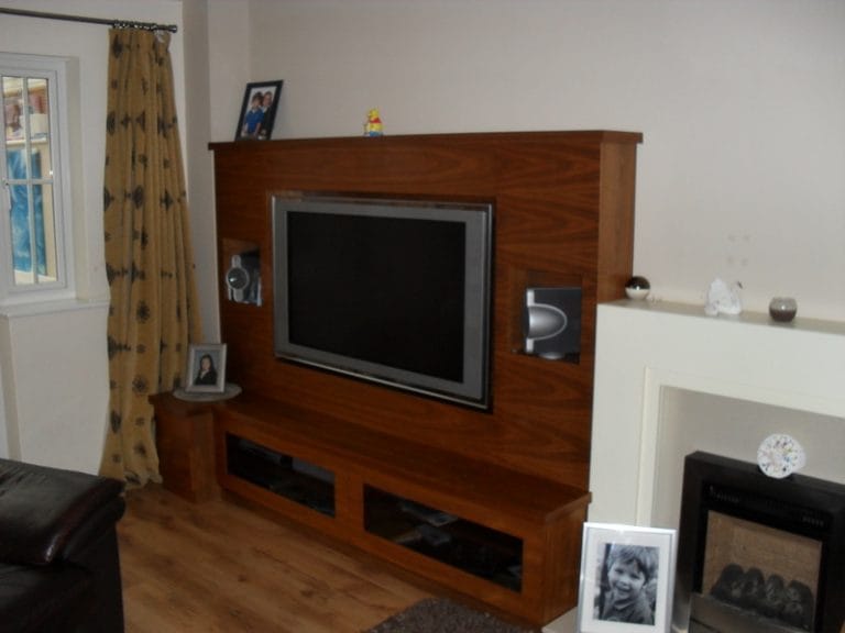Timber media wall with a recessed television
