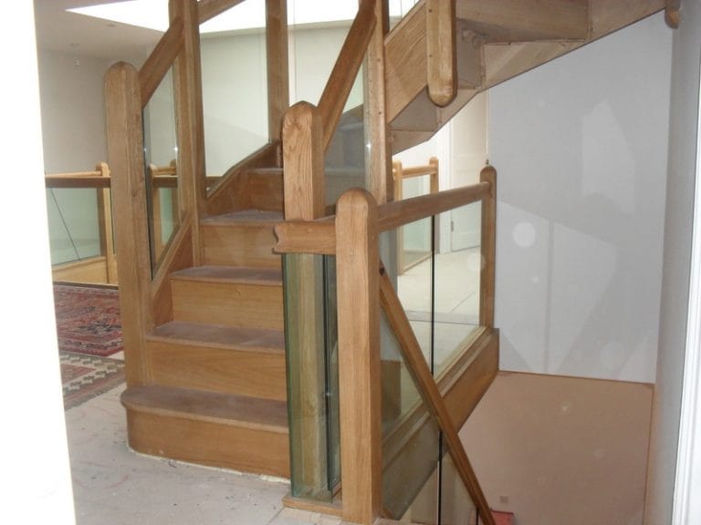 Timber and glass staircase with a quarter landing
