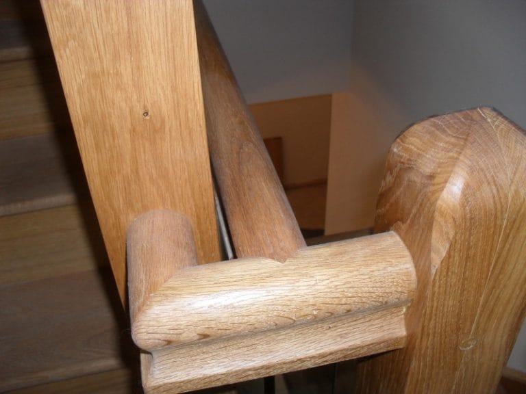 Detail of a shaped timber handrail joint