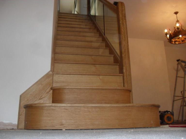 Wide timber staircase with bullnose bottom steps