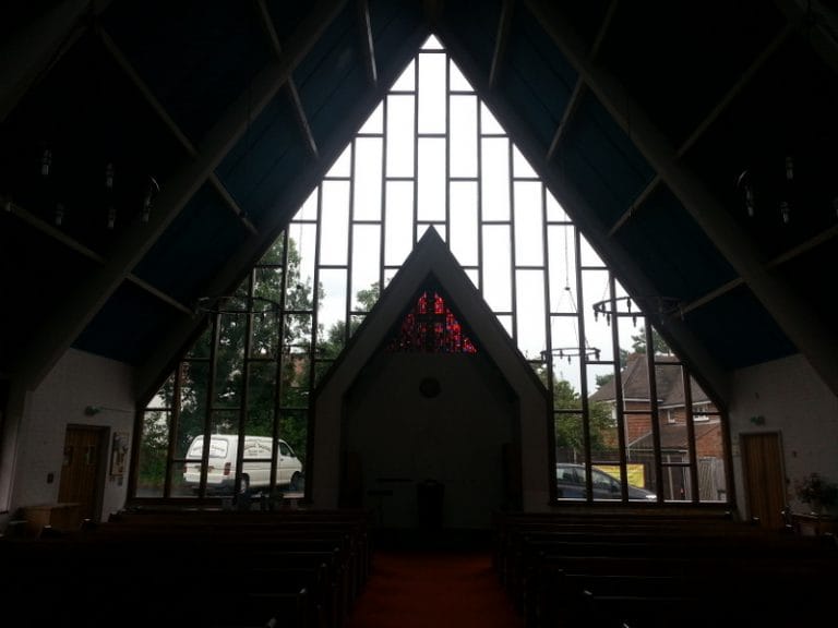 Church gable window seen from inside against the light