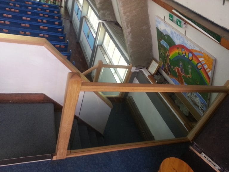 Timber framed glass screen in a church gallery
