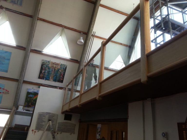 Timber gallery with glazed screens inside a public building