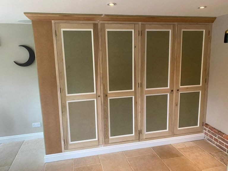 Timber fitted cupboard doors with frosted glass panels